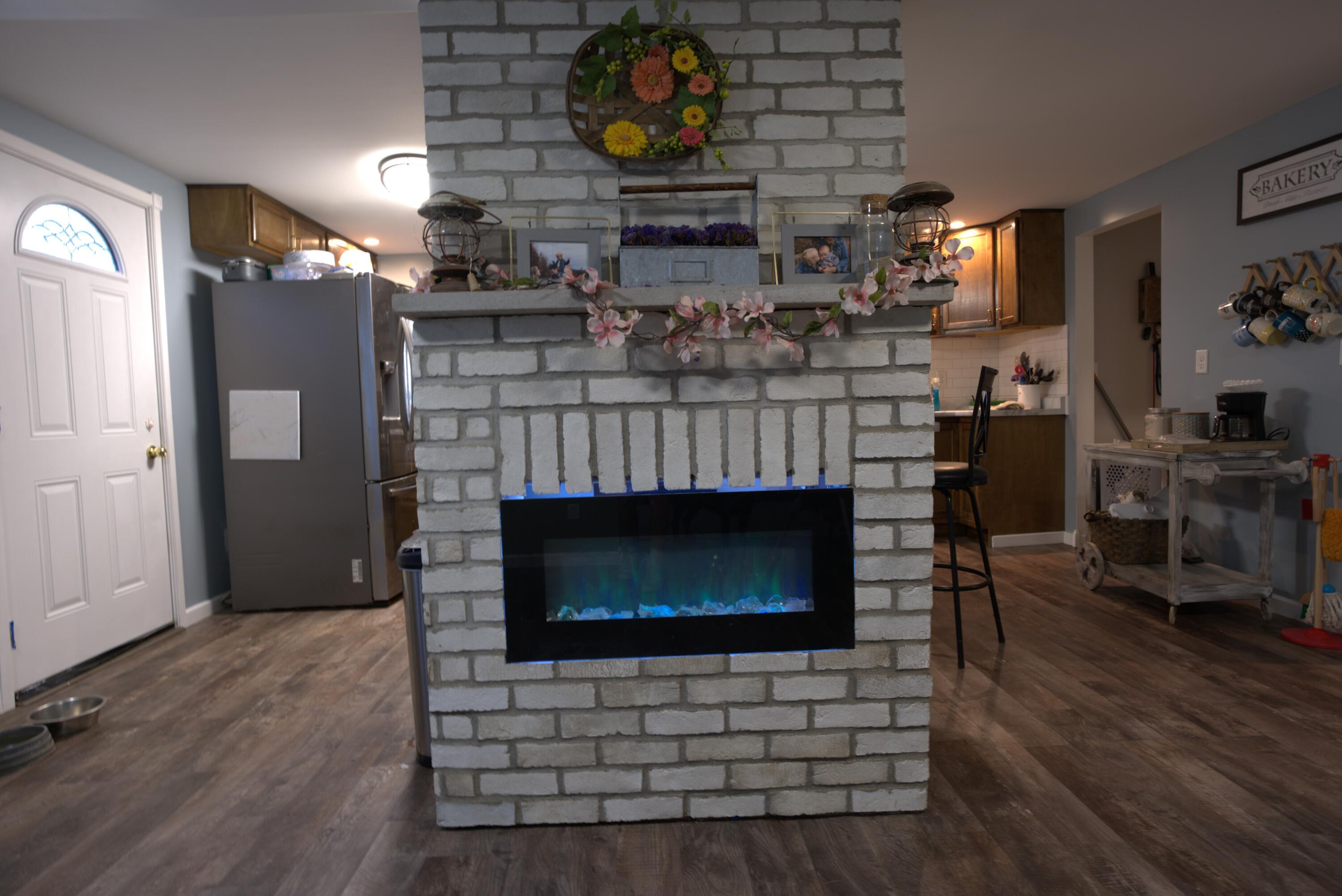 6033 North Stiles Road Ludington, MI 49431 - Photo 8 of 18 fire place