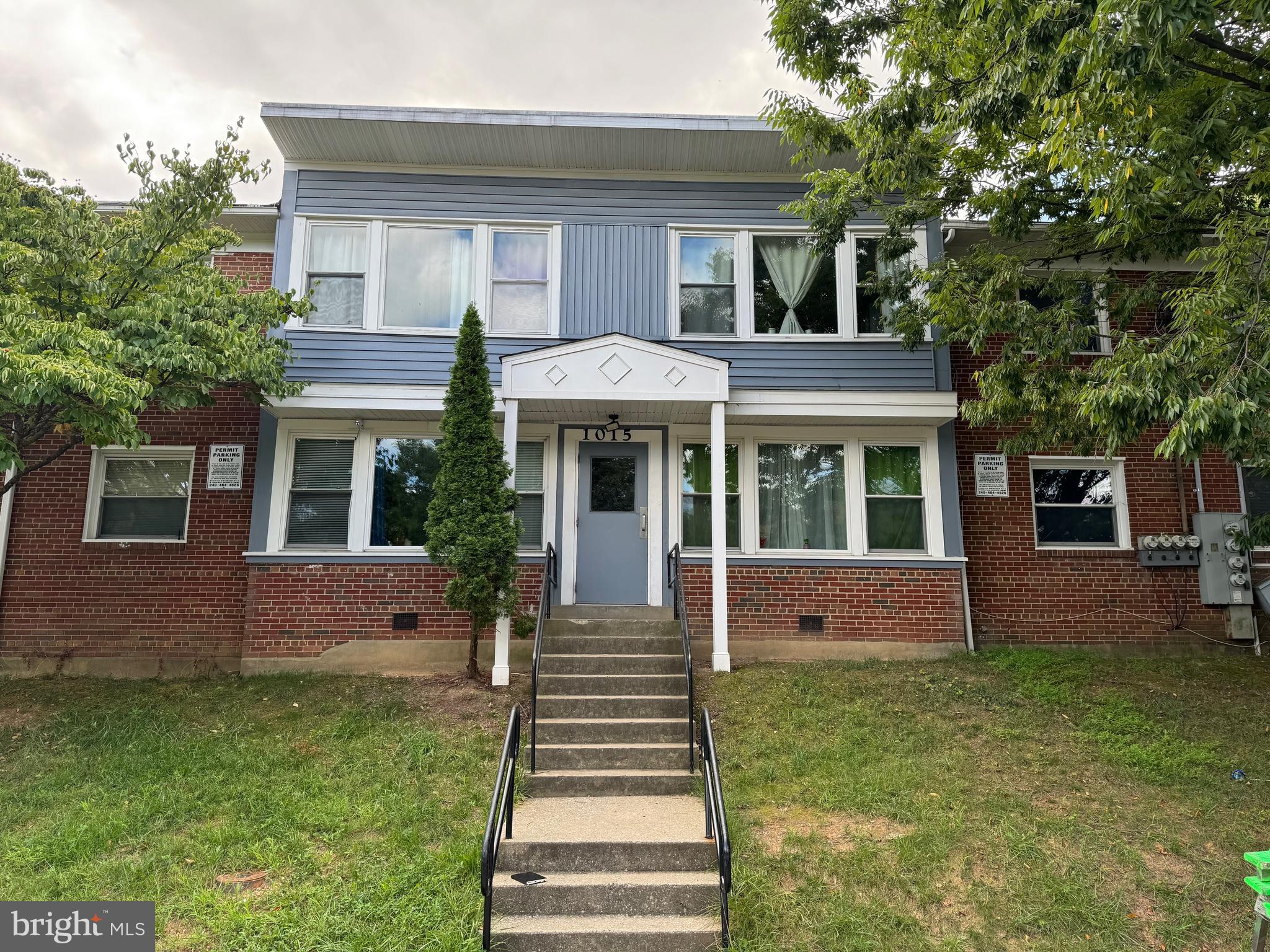 1015 Quebec Terrace Silver Spring, MD 20903 - Photo 4 of 13 a front view of a house with a garden