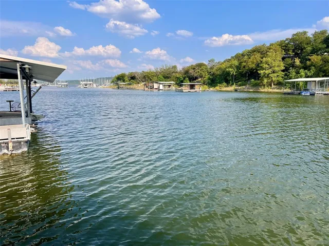 a view of a lake with a city view