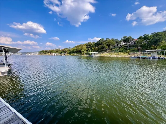 a view of a lake with a city