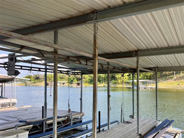 a view of room with wooden floor