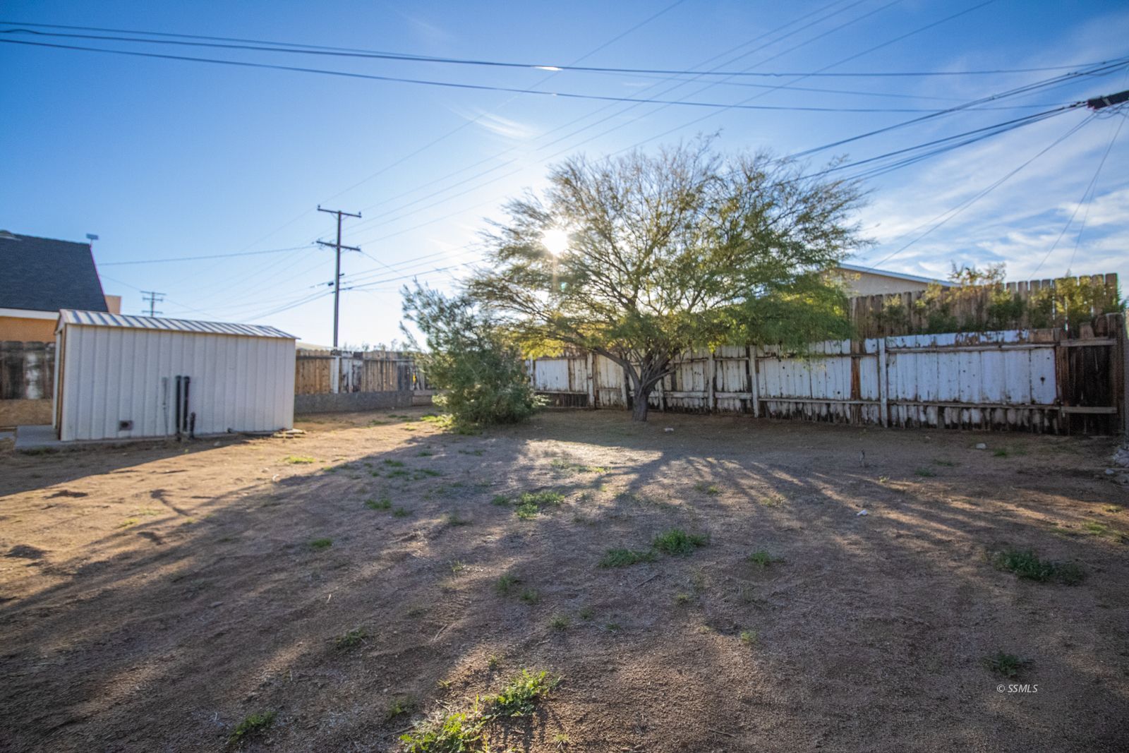 1621 Sims Street Ridgecrest, CA 93555 - Photo 23 of 24 a view of a backyard of the house