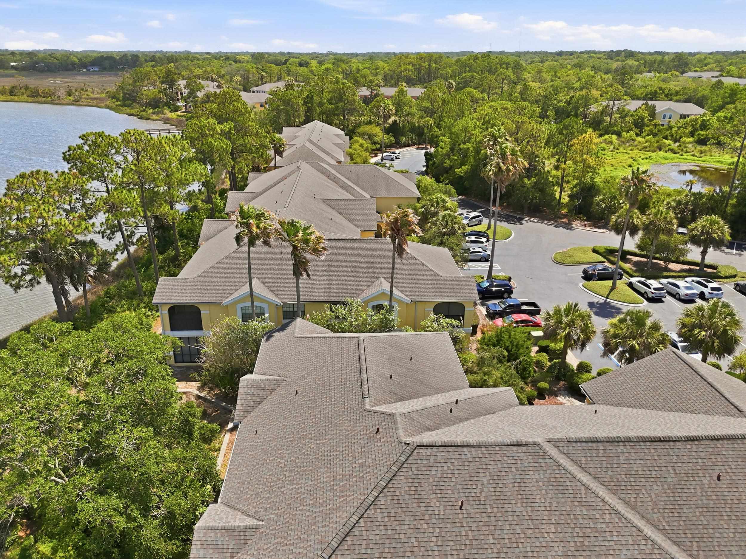 2500 Vista Cove Road St. Augustine, FL 32084 - Photo 50 of 53 an aerial view of residential houses with outdoor space and ocean view