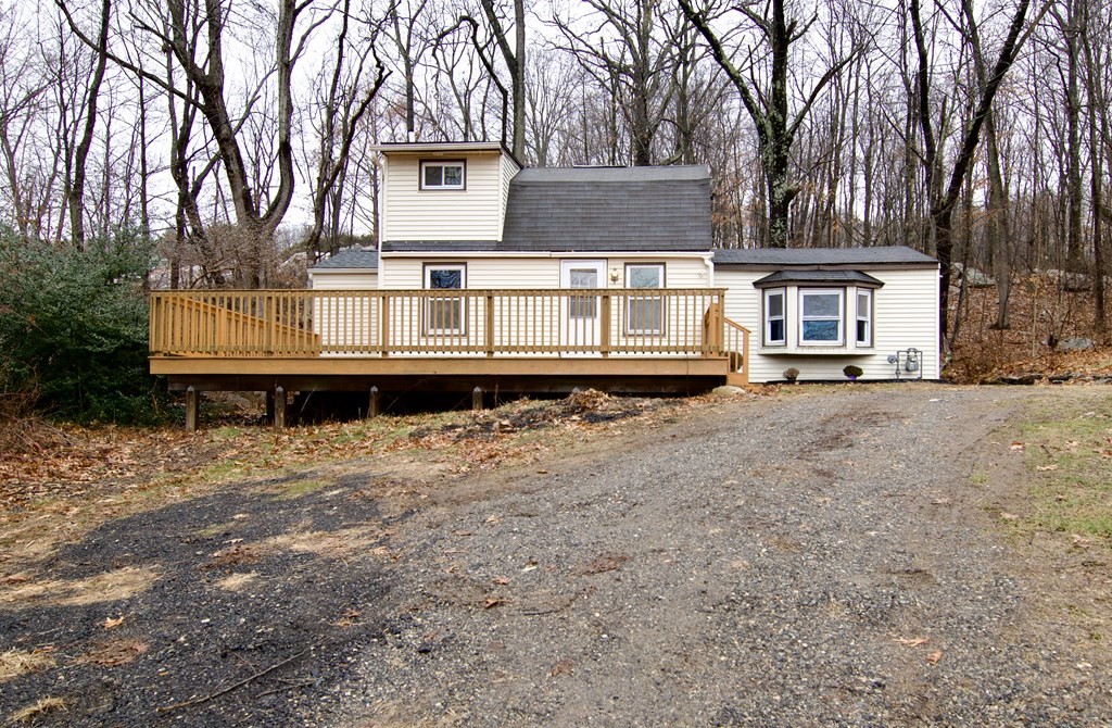 338 Wilbraham Road Hampden, MA 01036 - Photo 1 of 42 a front view of a house with a yard