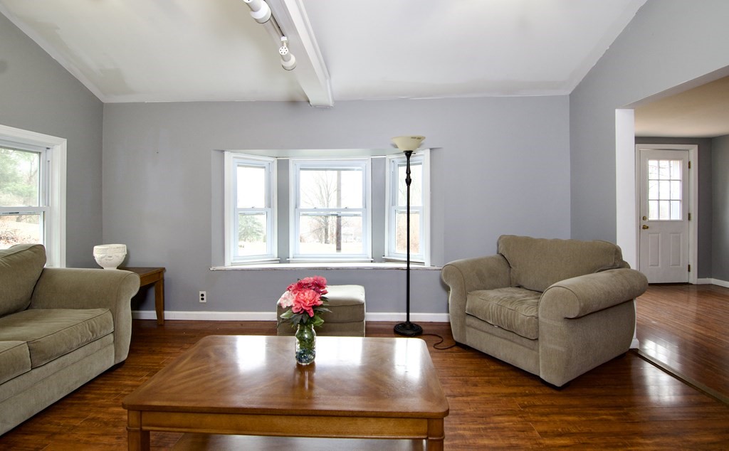 338 Wilbraham Road Hampden, MA 01036 - Photo 11 of 42 a living room with furniture and a large window