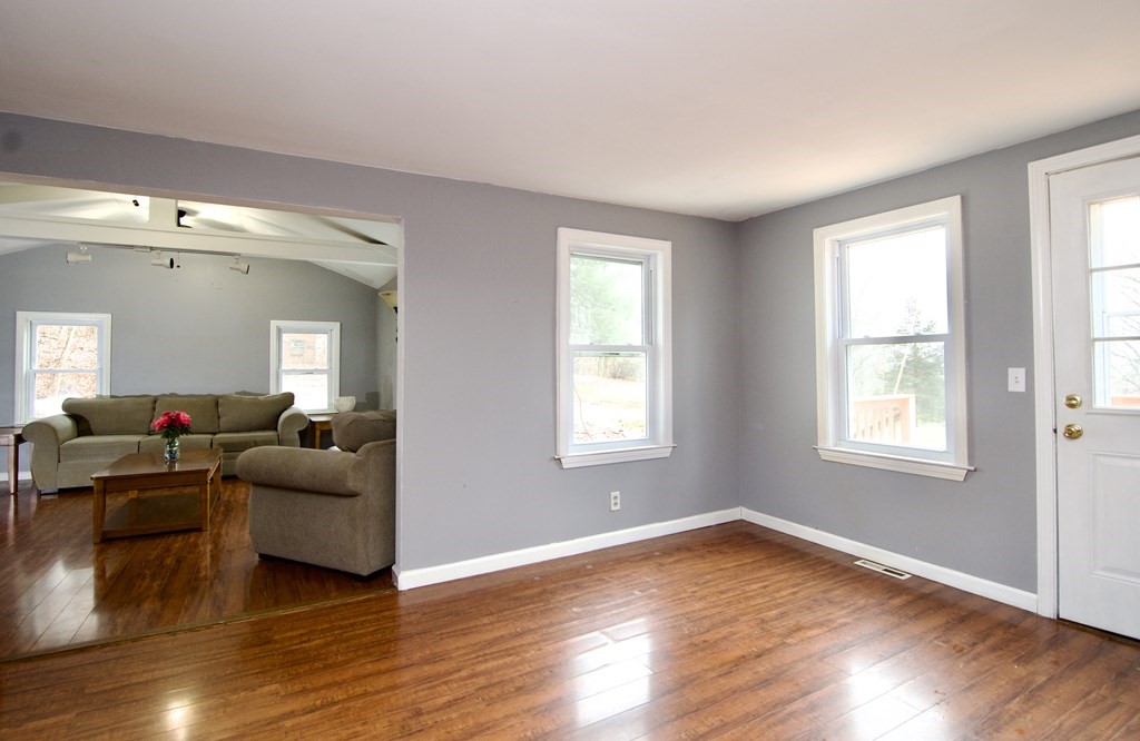 338 Wilbraham Road Hampden, MA 01036 - Photo 14 of 42 a living room with furniture and a wooden floor