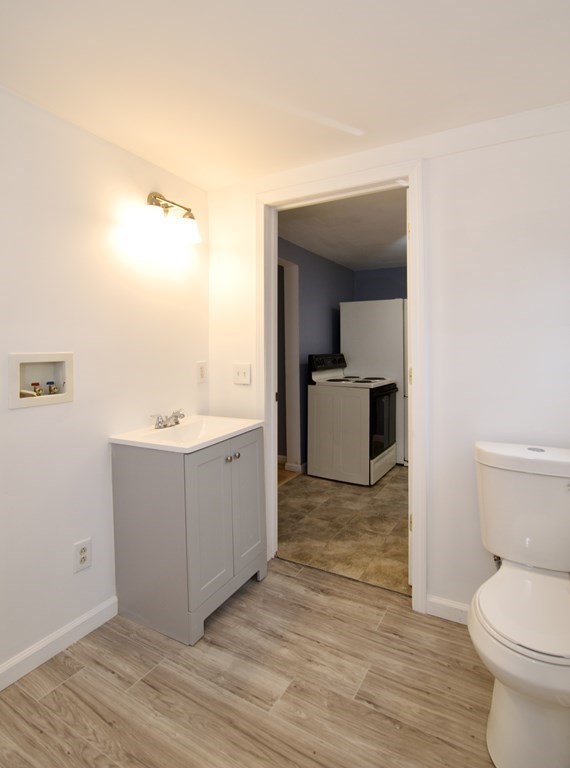 338 Wilbraham Road Hampden, MA 01036 - Photo 25 of 42 a view of bathroom with toilet sink and mirror