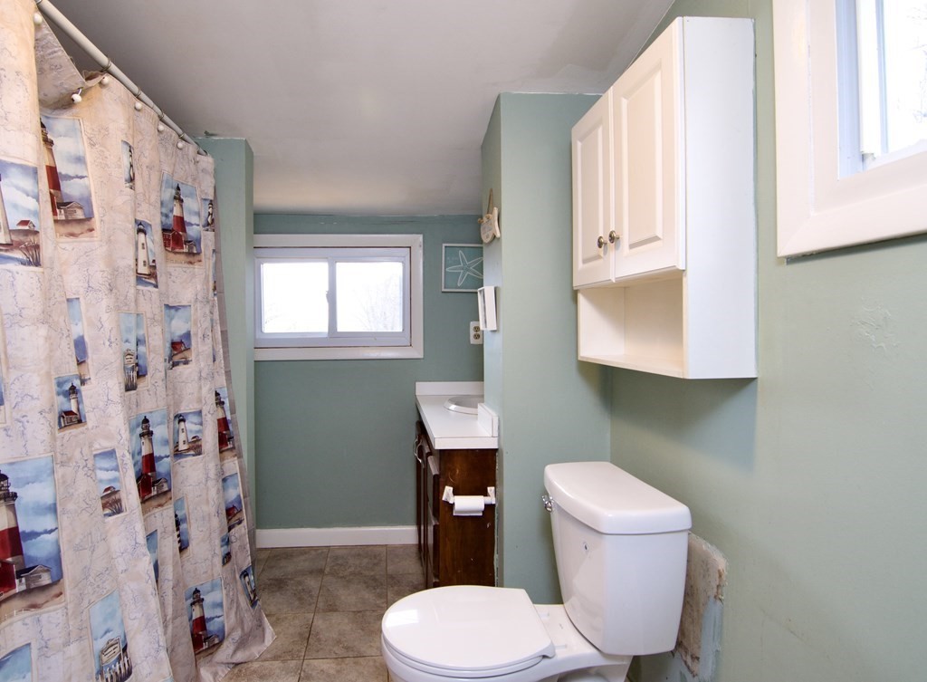 338 Wilbraham Road Hampden, MA 01036 - Photo 38 of 42 a white toilet sitting next to a bathroom sink