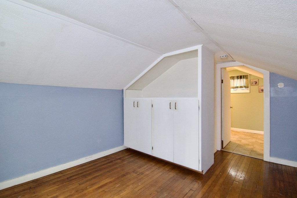 338 Wilbraham Road Hampden, MA 01036 - Photo 40 of 42 a view of an empty room with wooden floor and a window