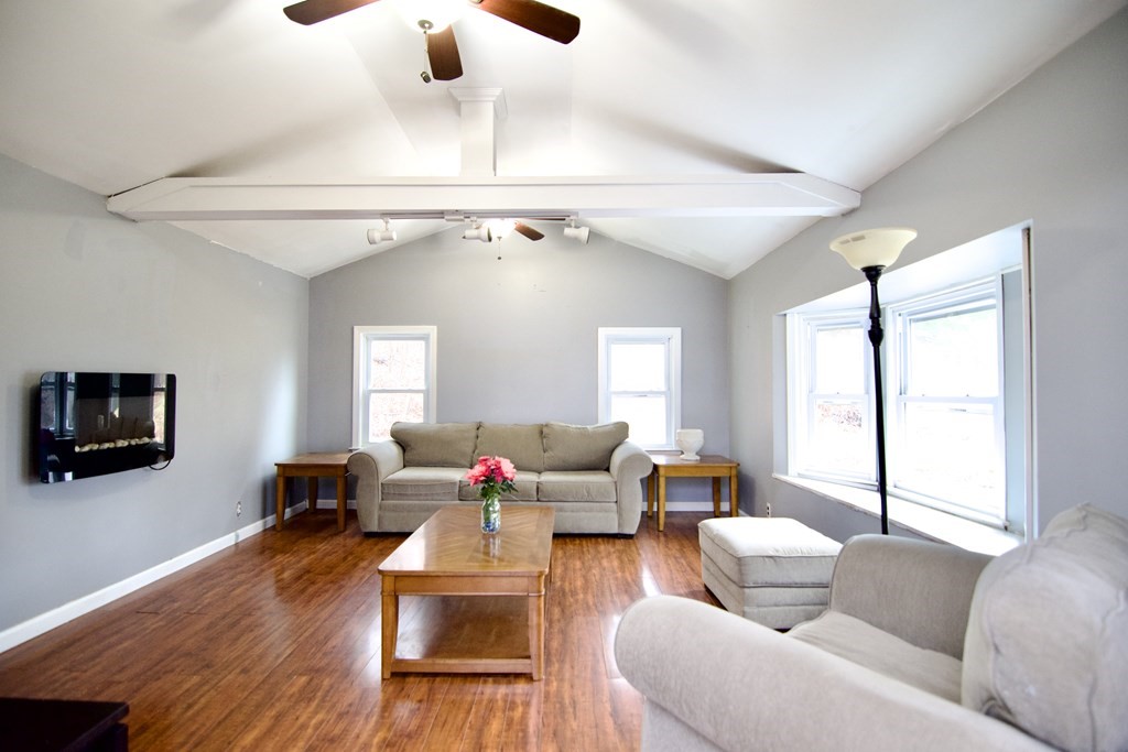 338 Wilbraham Road Hampden, MA 01036 - Photo 7 of 42 a living room with furniture or window and a flat screen tv