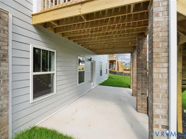a view of backyard with door