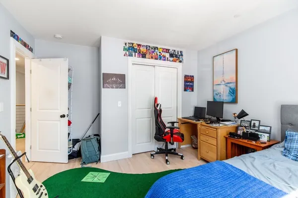 a view of a workspace with furniture and toys
