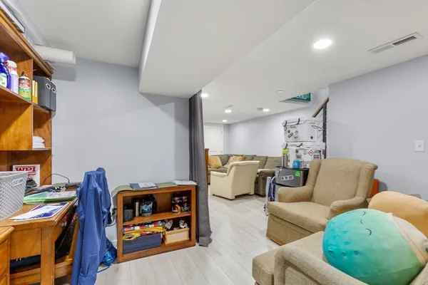 a living room with furniture and a couch