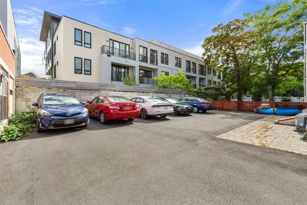 a cars parked in front of a building