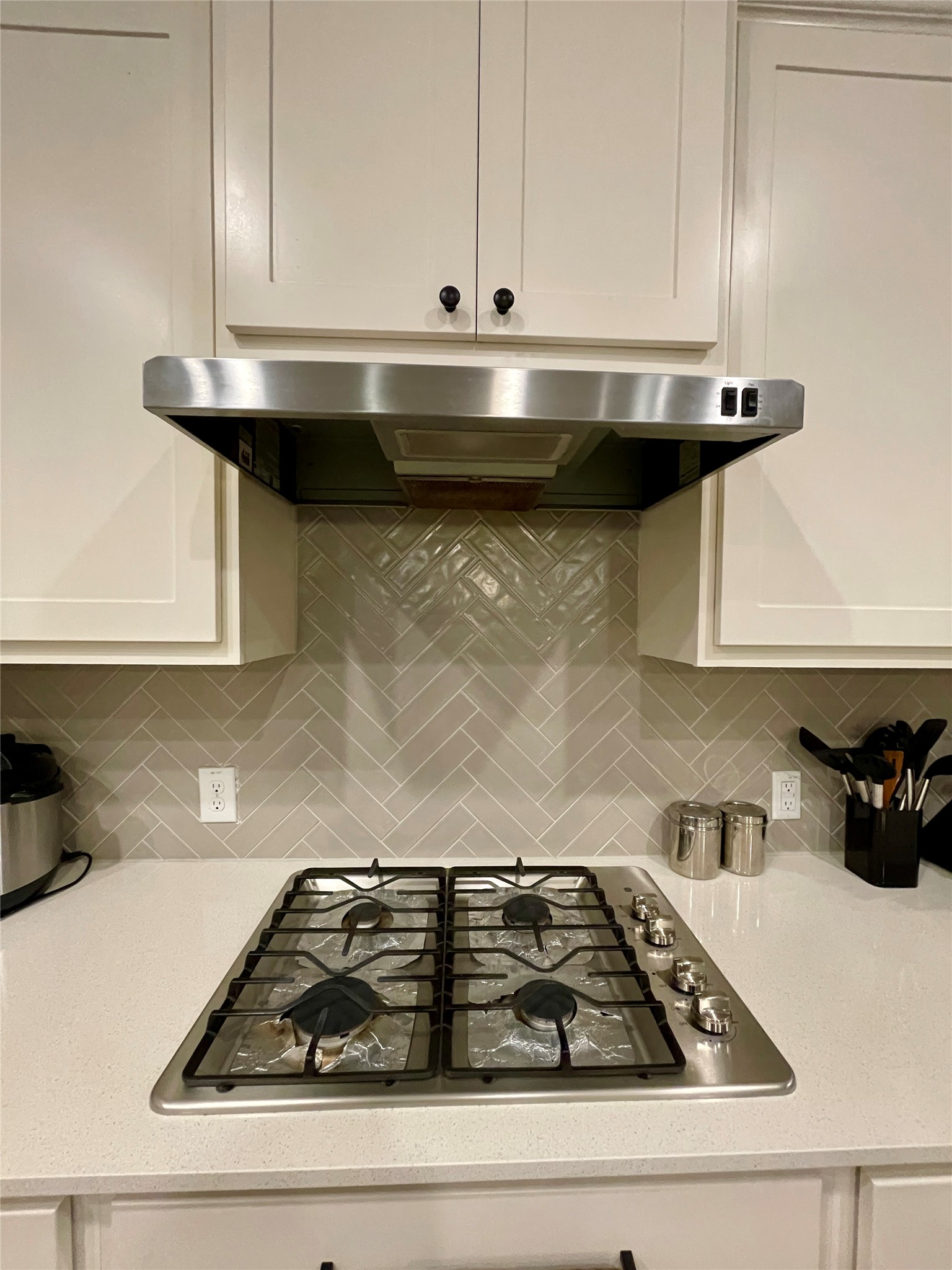 120 Sail Wind Way Georgetown, TX 78633 - Photo 7 of 25 a kitchen with a stove and cabinets