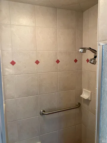 a bathroom with a sink a vanity and a window