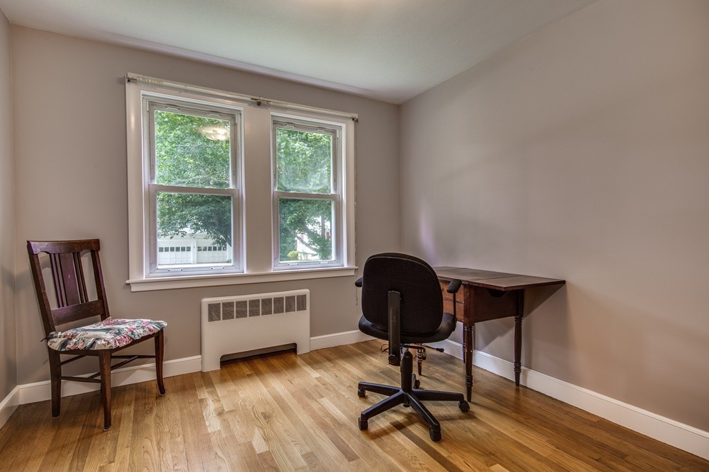 21 Putnam Road Bedford, MA 01730 - Photo 14 of 21 a living room with furniture and a window