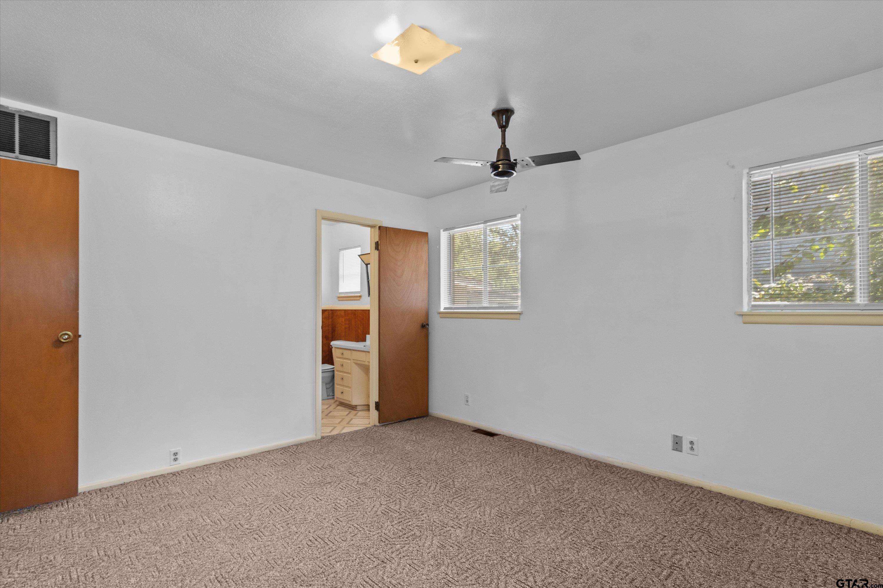 4168 Gallion Avenue Tyler, TX 75708 - Photo 13 of 27 a view of an empty room with a window