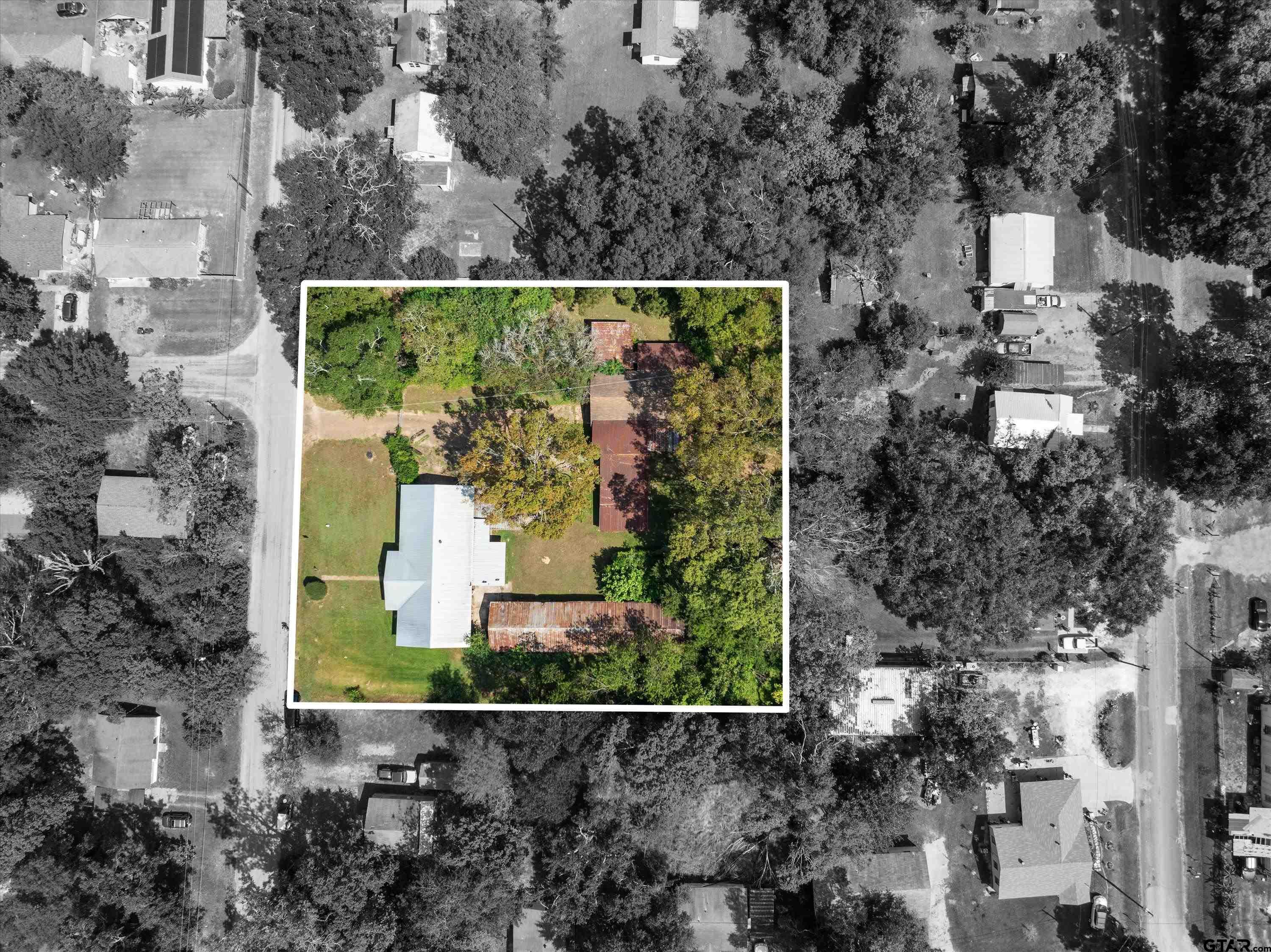 4168 Gallion Avenue Tyler, TX 75708 - Photo 2 of 27 an aerial view of a house with a yard