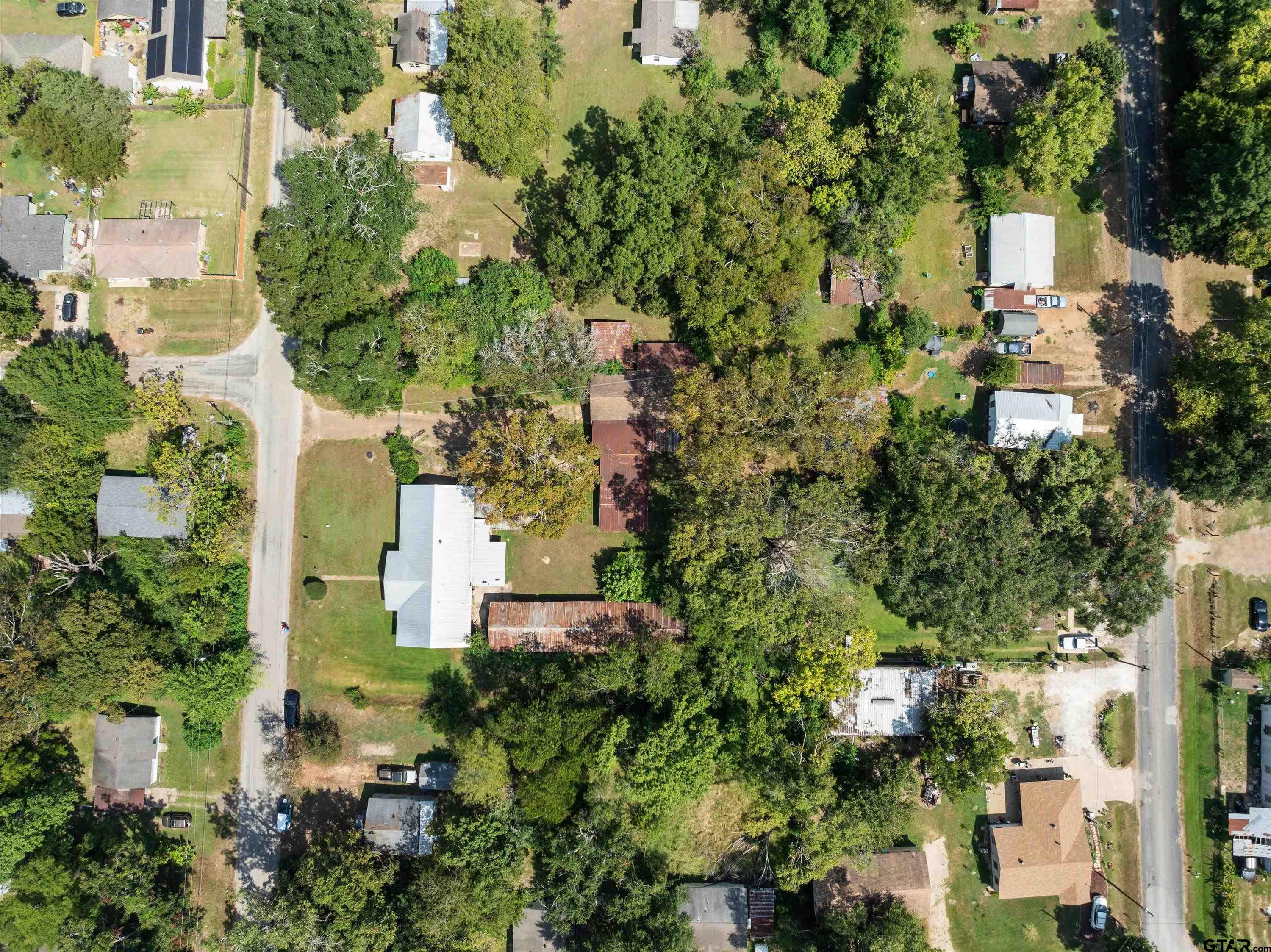 4168 Gallion Avenue Tyler, TX 75708 - Photo 27 of 27 an aerial view of a house with a yard