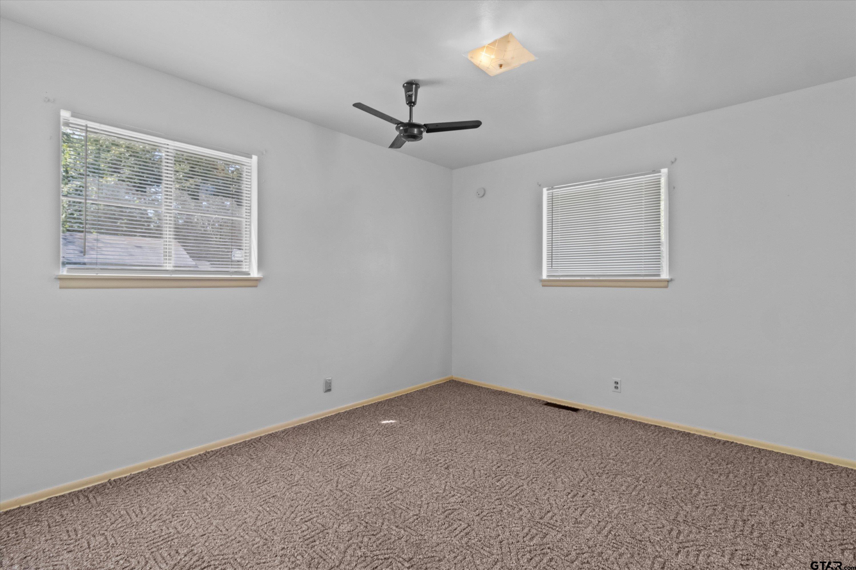 4168 Gallion Avenue Tyler, TX 75708 - Photo 10 of 27 a view of an empty room with a window
