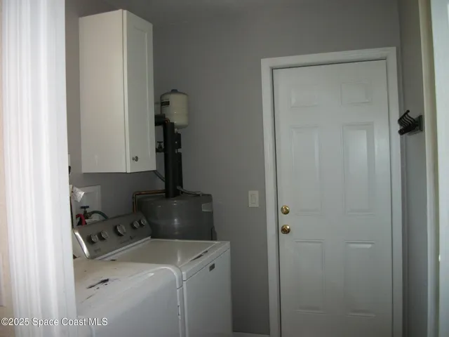 a room with storage and utility