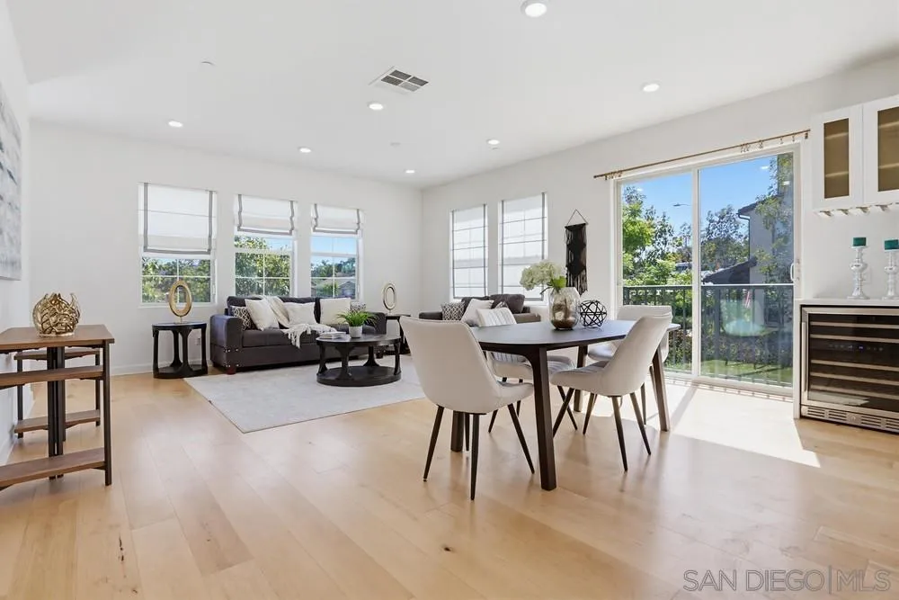 4373 Pacifica Way, Unit 6 Oceanside, CA 92056 - Photo 1 of 48 a view of a dining room with furniture window and outside view
