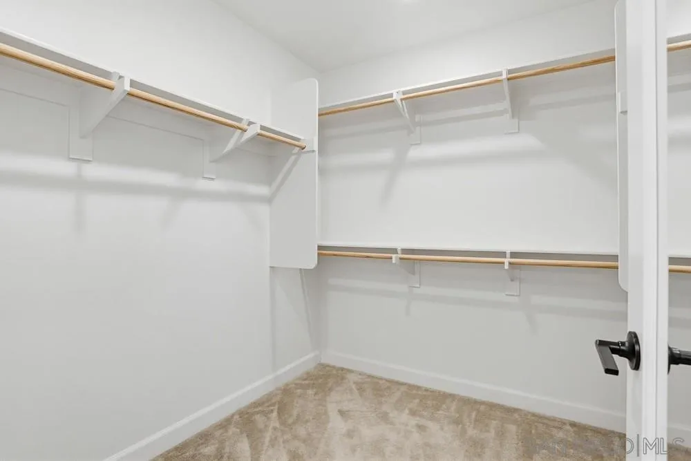 4373 Pacifica Way, Unit 6 Oceanside, CA 92056 - Photo 25 of 48 a view of an empty walk in closet
