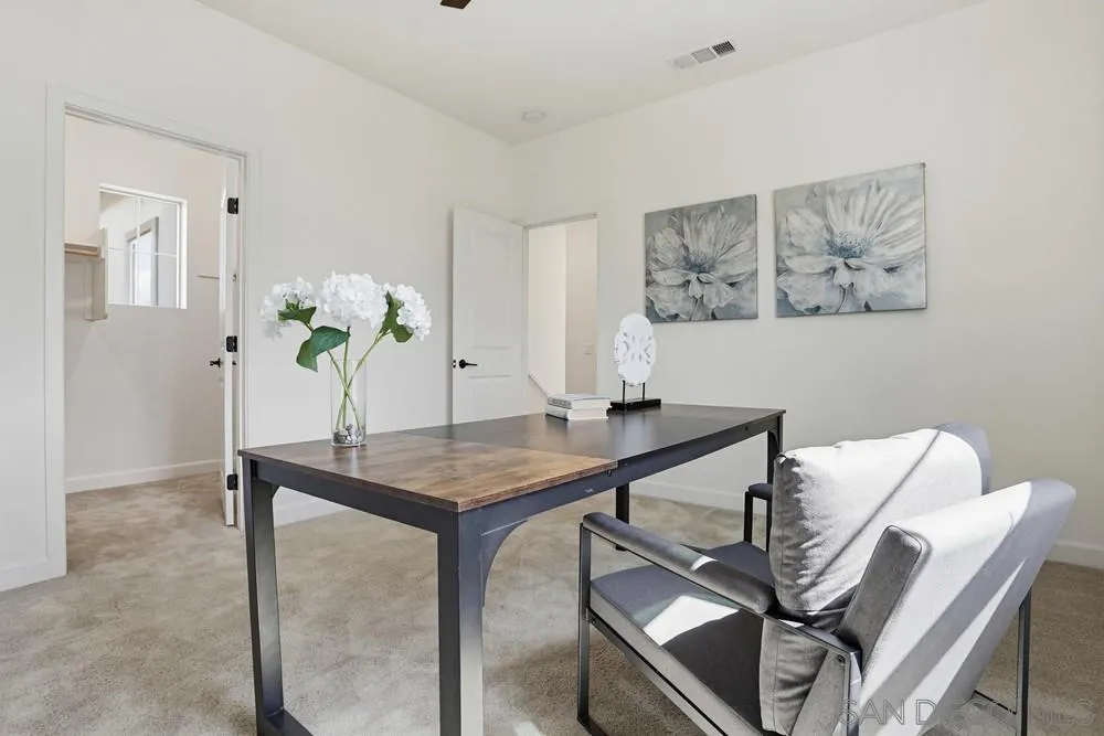 4373 Pacifica Way, Unit 6 Oceanside, CA 92056 - Photo 31 of 48 a view of a dining room with furniture
