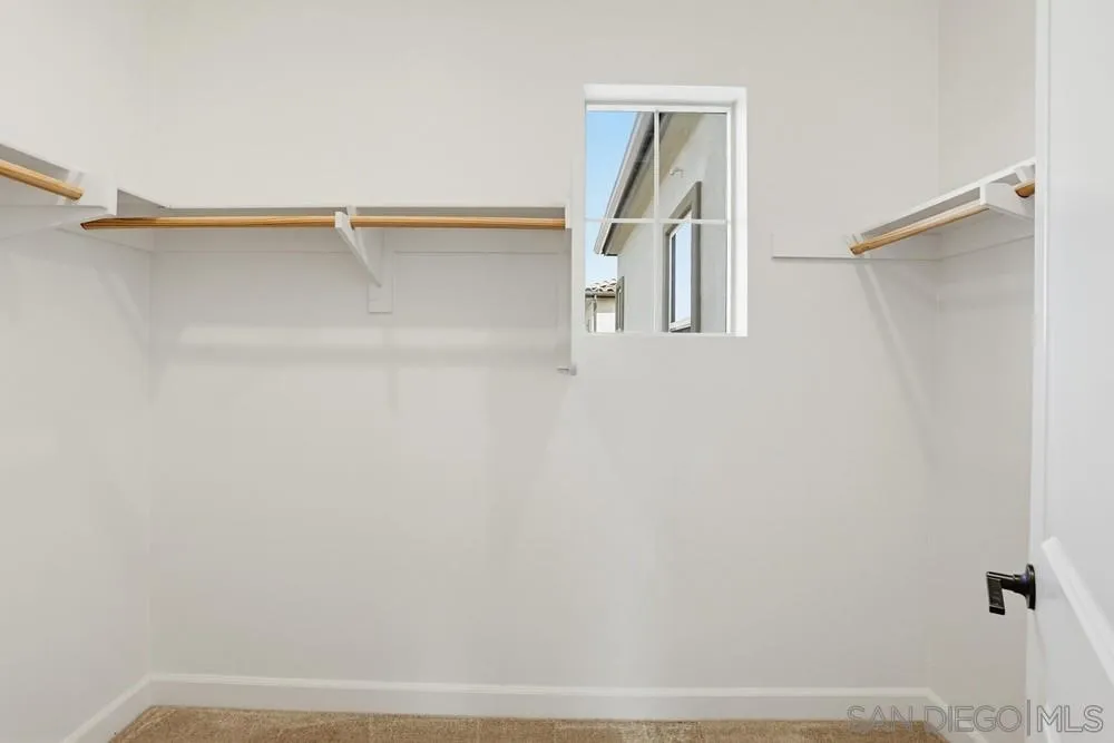 4373 Pacifica Way, Unit 6 Oceanside, CA 92056 - Photo 32 of 48 a view of walk in closet