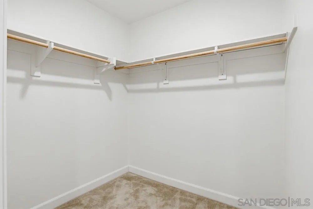 4373 Pacifica Way, Unit 6 Oceanside, CA 92056 - Photo 40 of 48 a view of an empty walk in closet