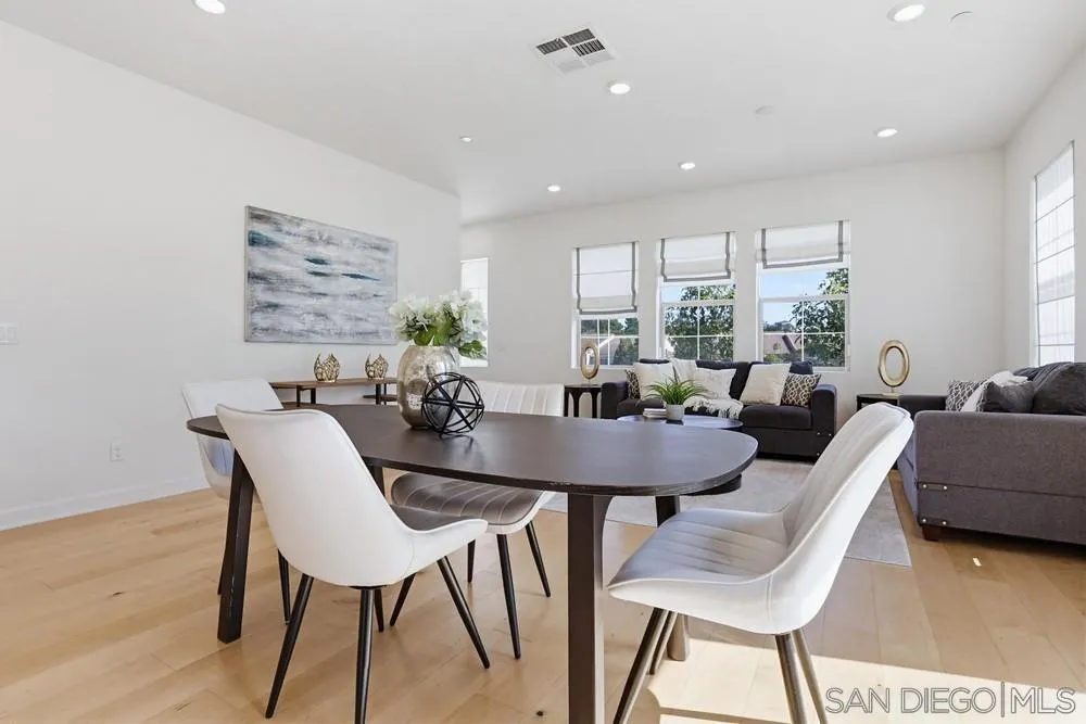 4373 Pacifica Way, Unit 6 Oceanside, CA 92056 - Photo 6 of 48 a view of a dining room with furniture window and outside view