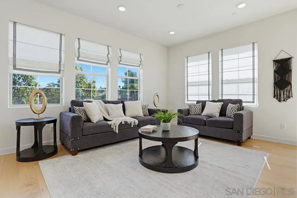 4373 Pacifica Way, Unit 6 Oceanside, CA 92056 - Photo 8 of 48 a living room with furniture and a open window
