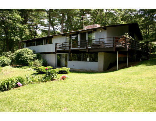 36 Hampshire Road Wayland, MA 01778 - Photo 16 of 21 a front view of a house with a yard