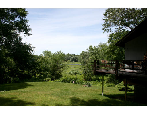 36 Hampshire Road Wayland, MA 01778 - Photo 21 of 21 a backyard of a house with lots of green space