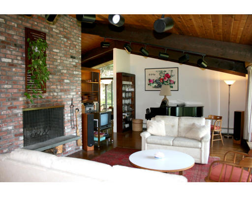 36 Hampshire Road Wayland, MA 01778 - Photo 4 of 21 a living room with furniture and a fireplace
