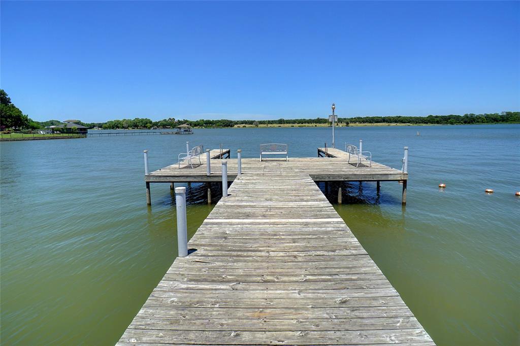 261 Timberlake Drive Azle, TX 76020 - Photo 4 of 32 Private and gated, fishing pier for residents. There have been big ones caught right off the pier!