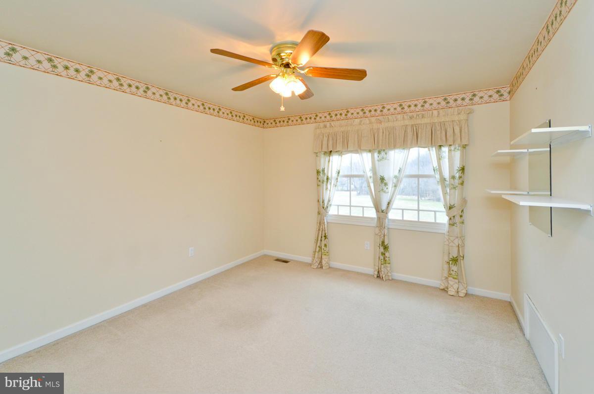 15615 Riding Stable Road Laurel, MD 20707 - Photo 22 of 30 a view of an empty room with a window