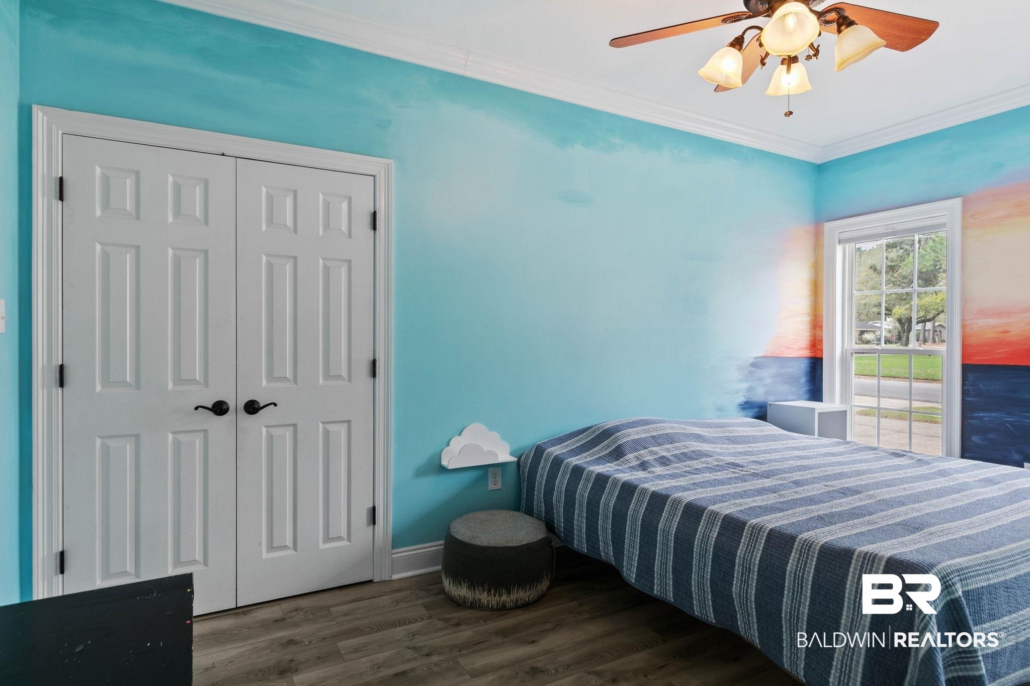 3668 Claridge Road North Mobile, AL 36608 - Photo 67 of 100 Bedroom featuring dark wood-type flooring, crown molding, ceiling fan, and a closet