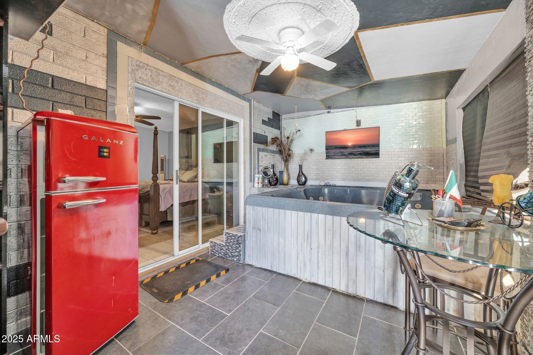 7629 West Osborn Road Phoenix, AZ 85033 - Photo 31 of 43 Hot tub off primary suite