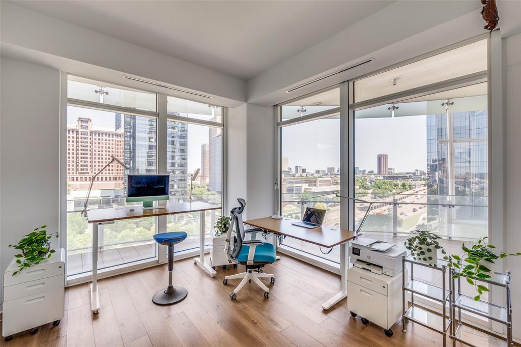 1918 Olive Street, Unit 701 Dallas, TX 75201 - Photo 20 of 40 a living room with furniture and a large window