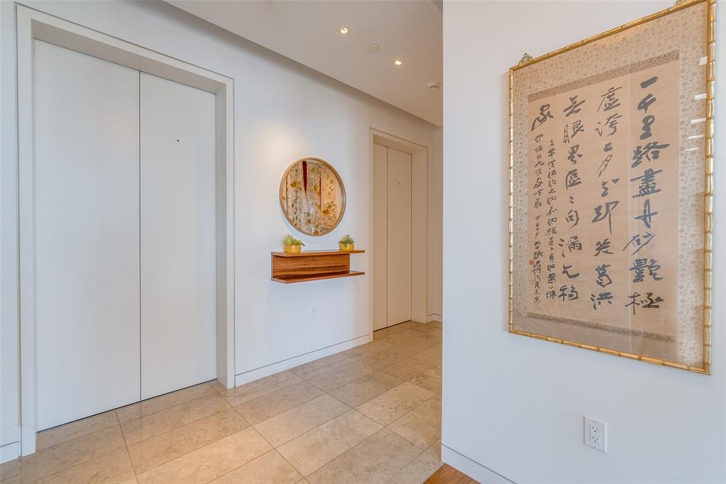 1918 Olive Street, Unit 701 Dallas, TX 75201 - Photo 2 of 40 a view of a hallway to rooms