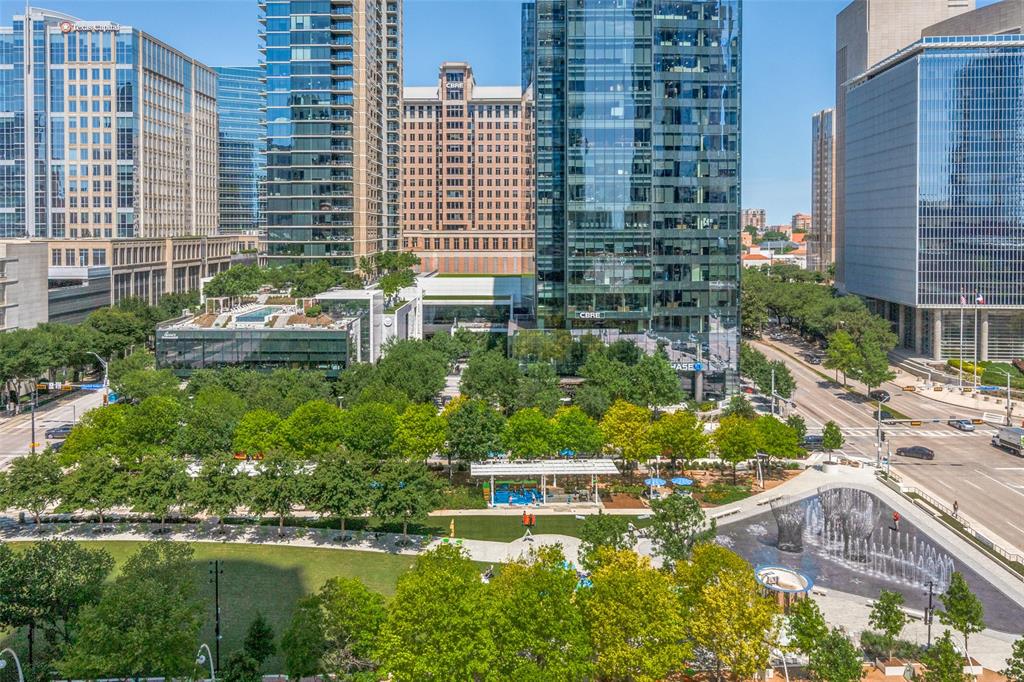1918 Olive Street, Unit 701 Dallas, TX 75201 - Photo 26 of 40 a view of a lake with a building