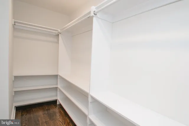 a storage room with wooden floor