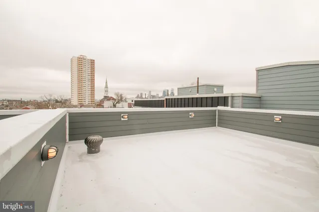a view of a terrace with couches