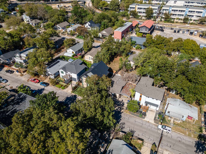 2406 Santa Maria Street Austin, TX 78702 - Photo 4 of 6 an aerial view of residential houses with outdoor space and trees