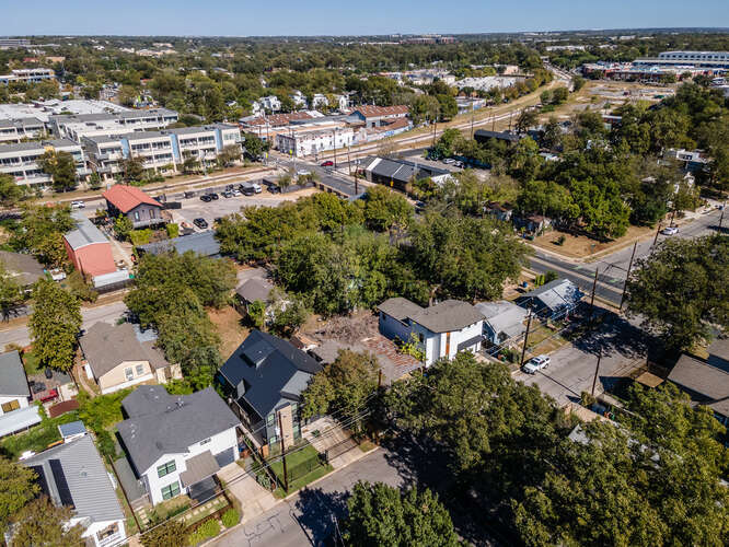 2406 Santa Maria Street Austin, TX 78702 - Photo 5 of 6 an aerial view of residential houses with city view
