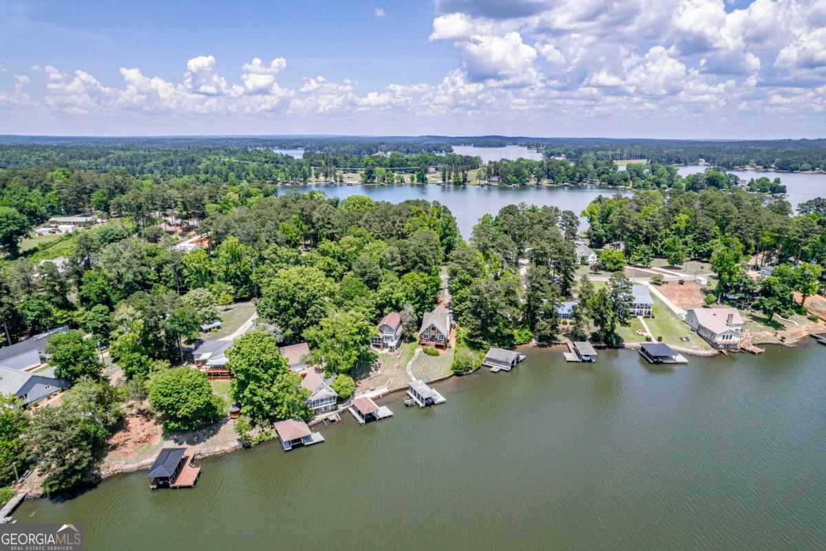 172 Mays Road Milledgeville, GA 31061 - Photo 51 of 54 a view of a lake with a mountain in the back