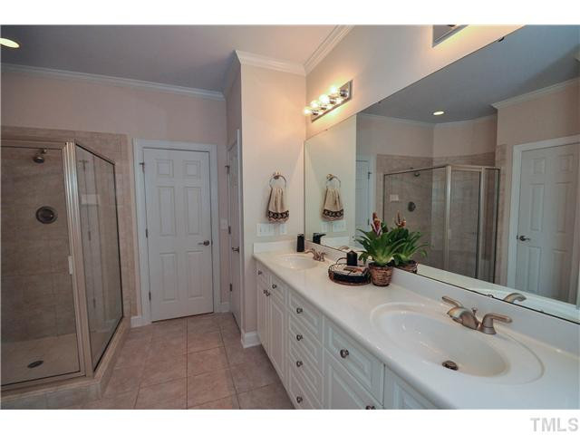 1611 Weatherford Circle Raleigh, NC 27604 - Photo 15 of 25 Luxurious master bath with large dual vanity with plenty of storage space, great whirlpool tub, and shower Master Bath/Spa