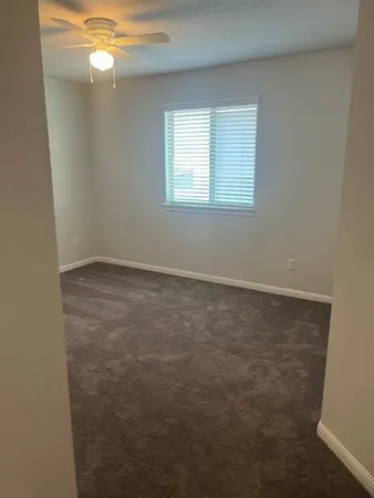 a view of a backyard of a house